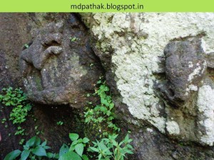 ganesha carvings at side of steps at kothaligad